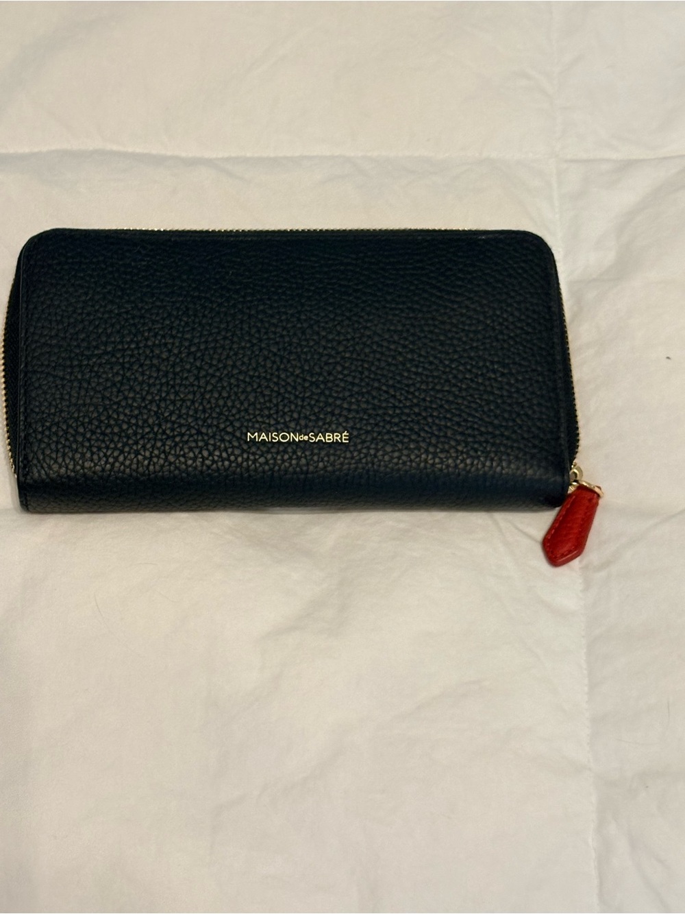 MAISON de SABRÉ Black Leather Zip Wallet with Red Pull